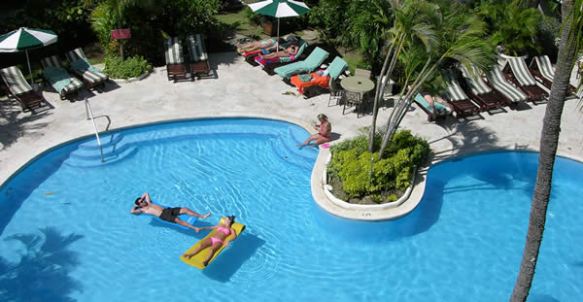 By the pool at Mango Bay Beach Resort  on Barbados